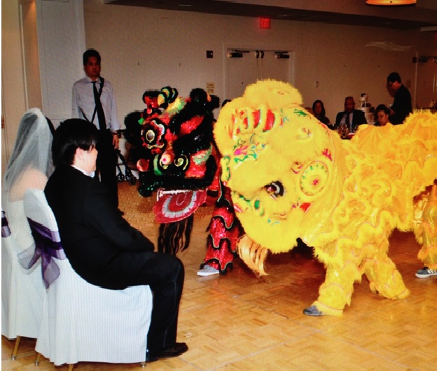 Couple enjoying their Lion Dance for good luck and happiness!!!